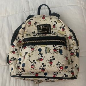 I am selling a loungelly Disney  Mickey Mouse, mini backpack